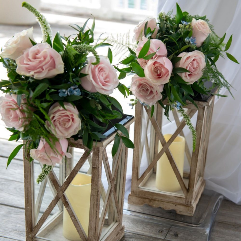 Lantern trio with blush roses