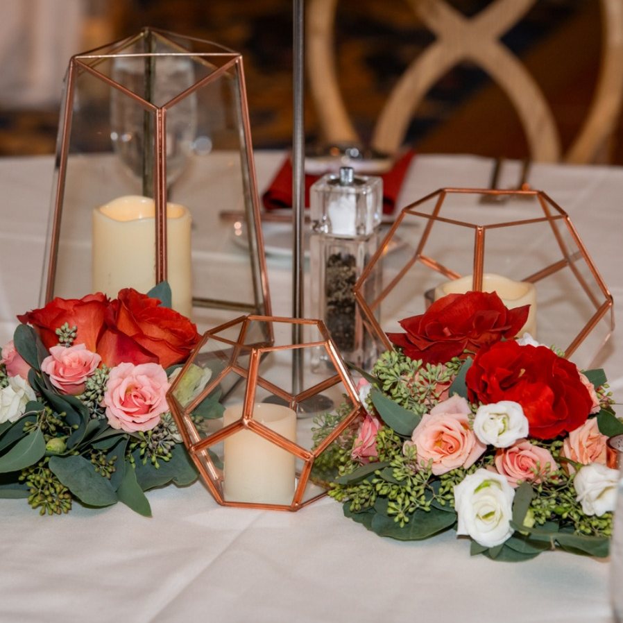Geometric copper & candle centerpiece