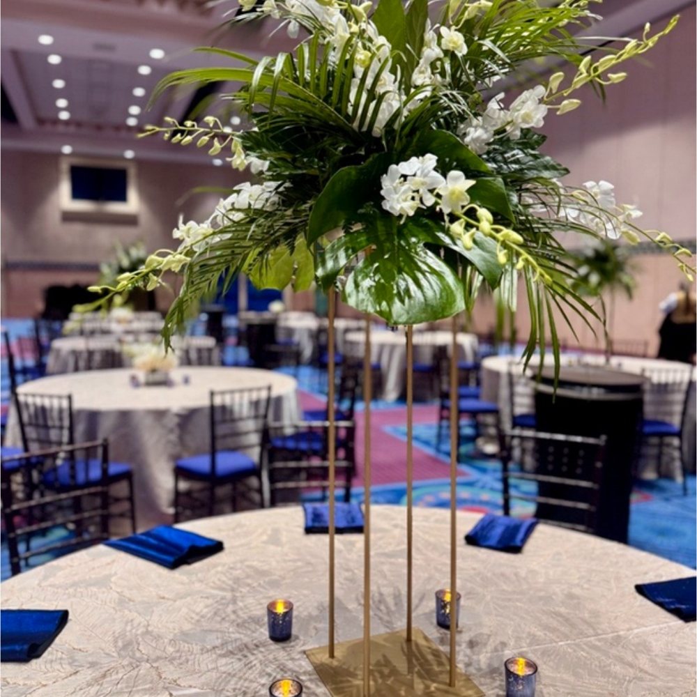 Tall tropical greenery centerpiece