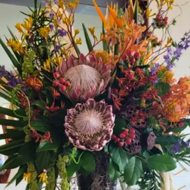 Protea & thistle arrangement