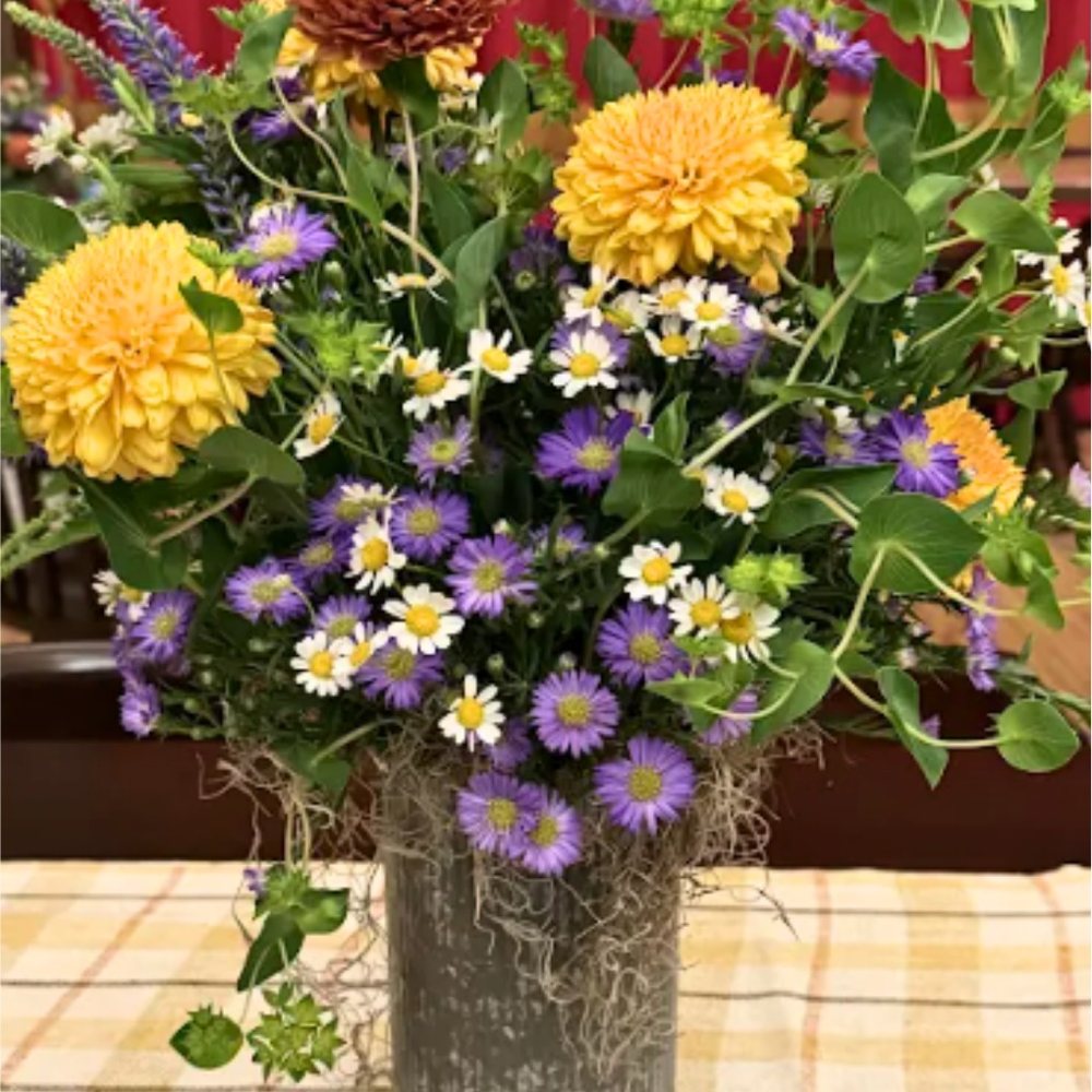 Wildflower arrangement in galvanized tin
