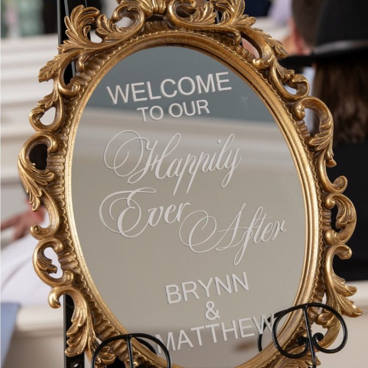 Ornate mirror welcome sign