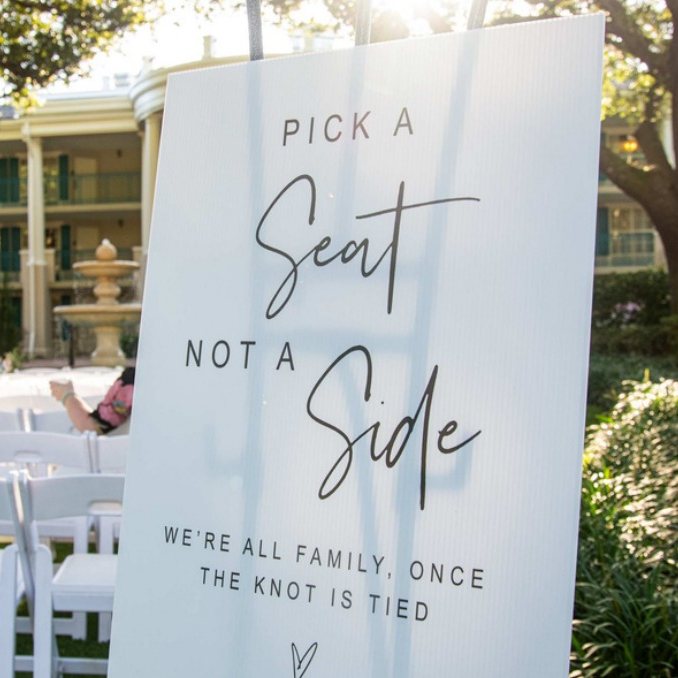 “Pick a seat” acrylic sign