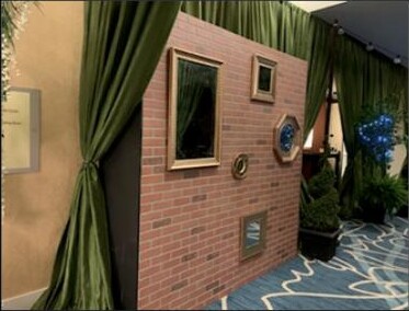 Brick wall backdrop unit with framed mirrors