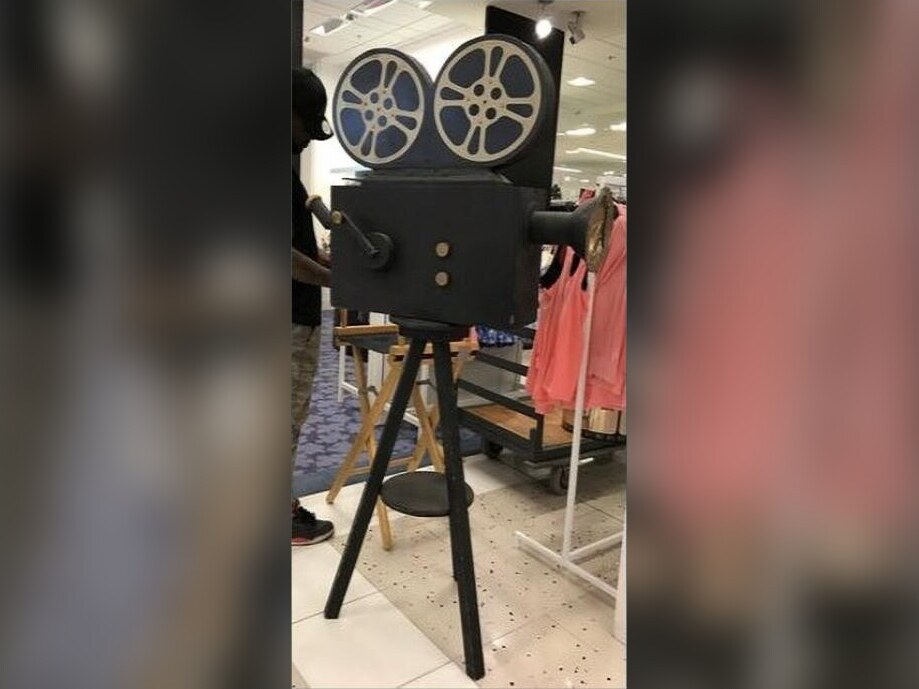 Vintage crank camera on tripod