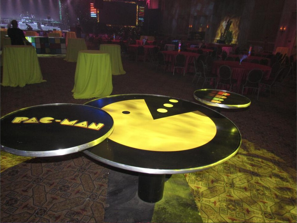 Tri-level Pac-Man themed food station tables