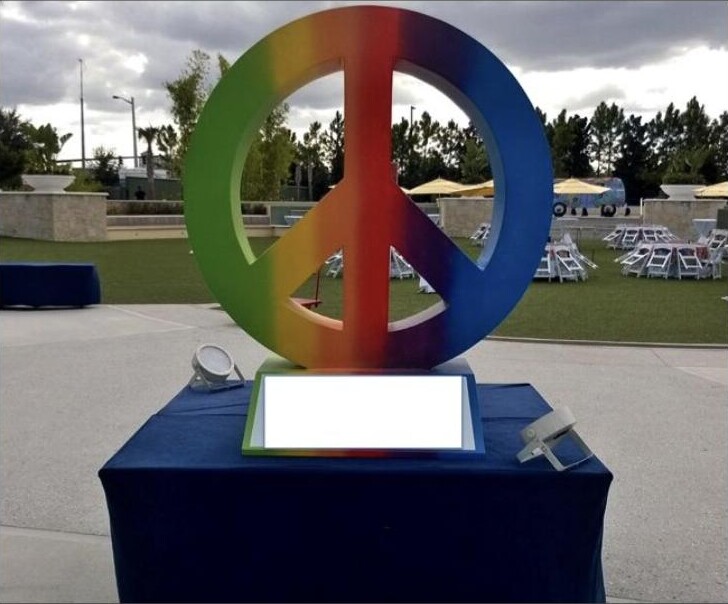 Oversized peace sign statue