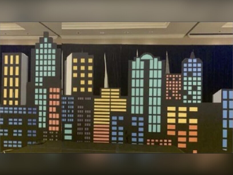 Illuminated city skyline backdrop panels