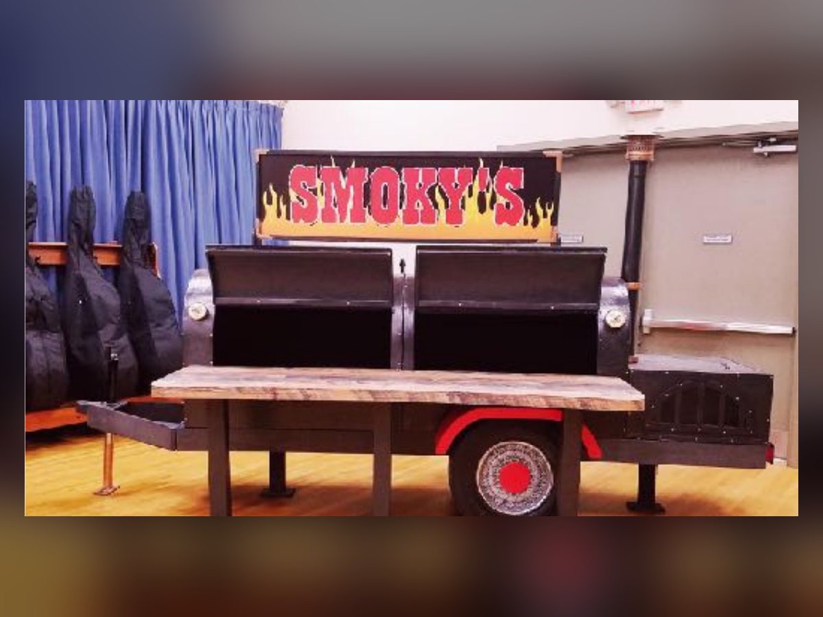 Smoky's smoker trailer buffet with faux fire effects