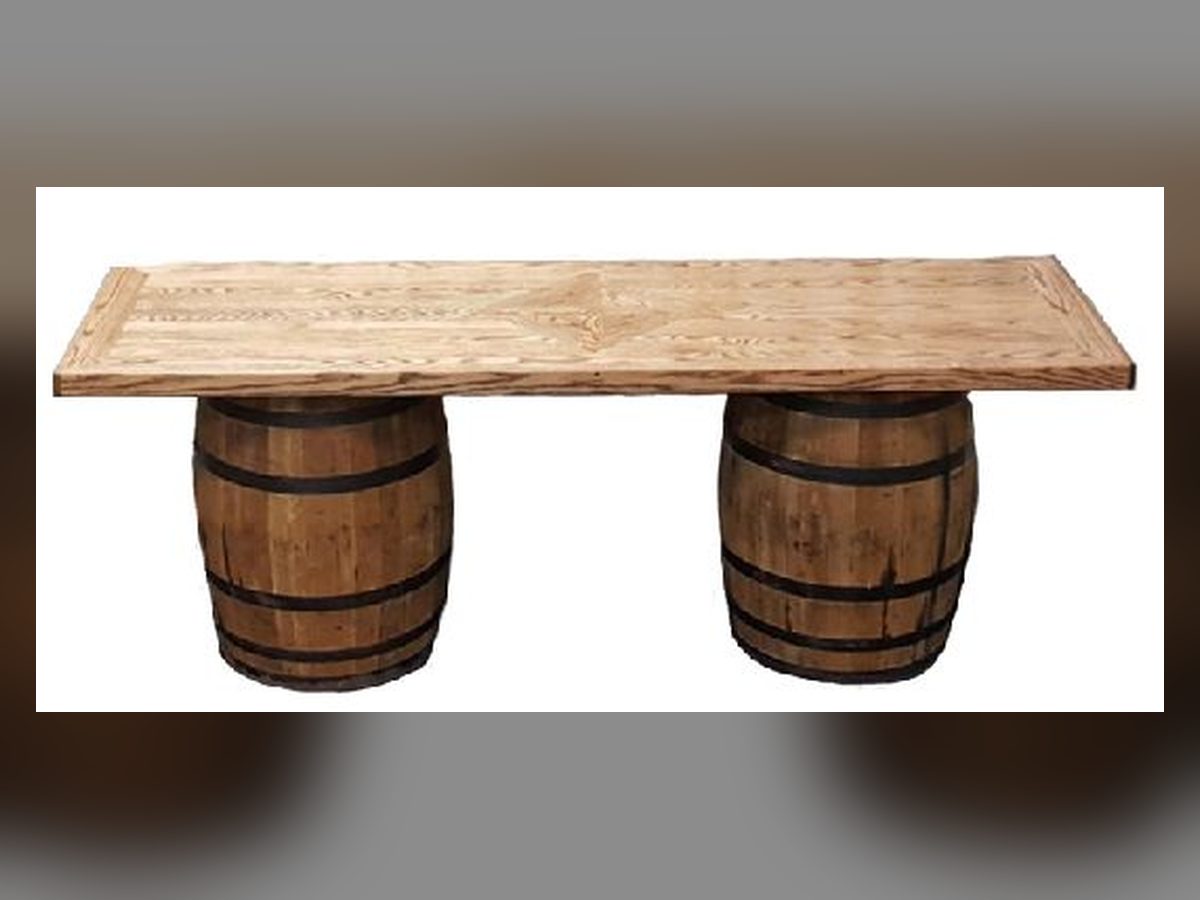 Wood plank buffet top on two whiskey barrels