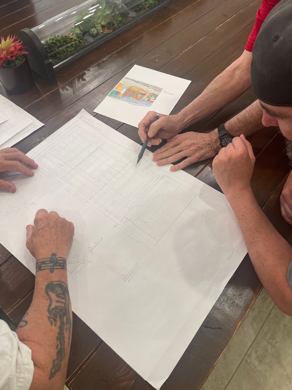 Designers sketching a custom prop